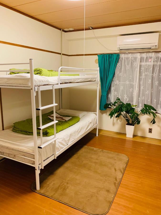 Guesthouse Shiawase Eki Fukuoka  Esterno foto